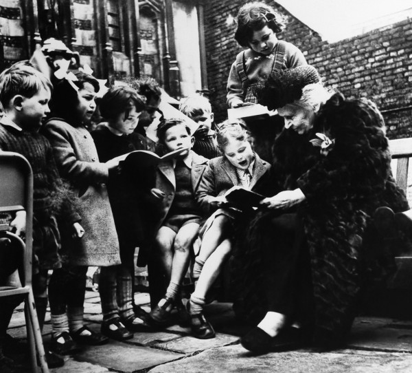 Maria Montessori, Italian educator, with a large group of children from one of her "works" in Italy. (AP Photo)